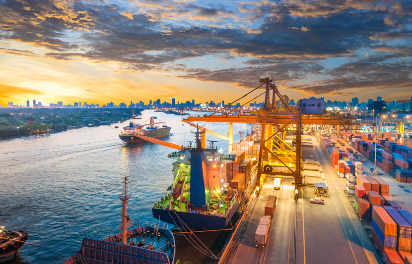  Container Cargo ship and crane bridge in shipyard