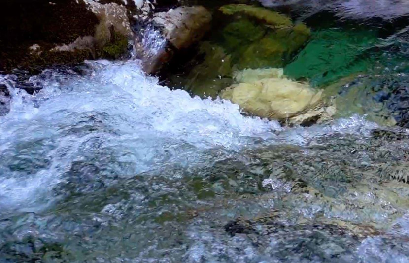 Image of water flowing over rocks